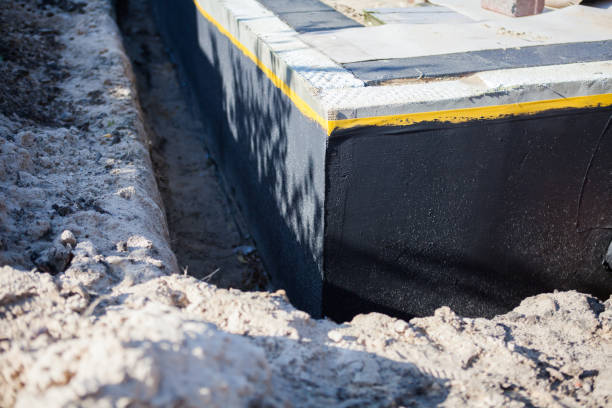 Professional Waterproofing technician working in Richland, MI